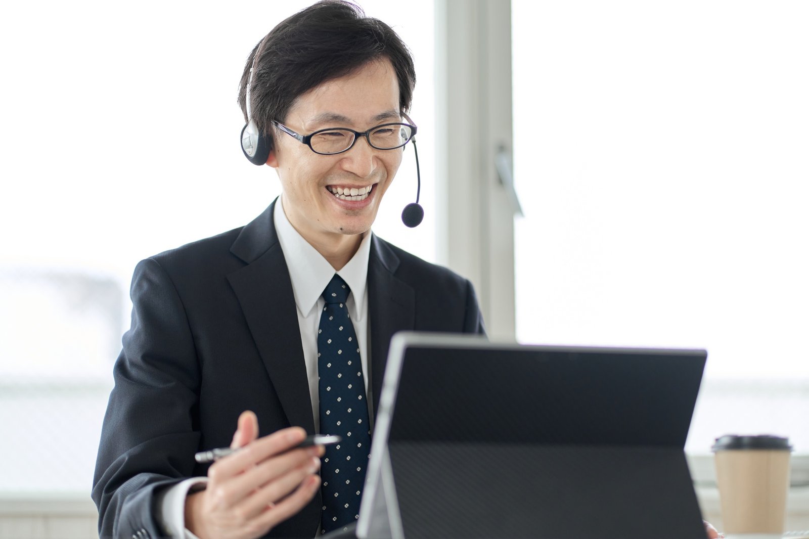 Asian businessman having a remote meeting